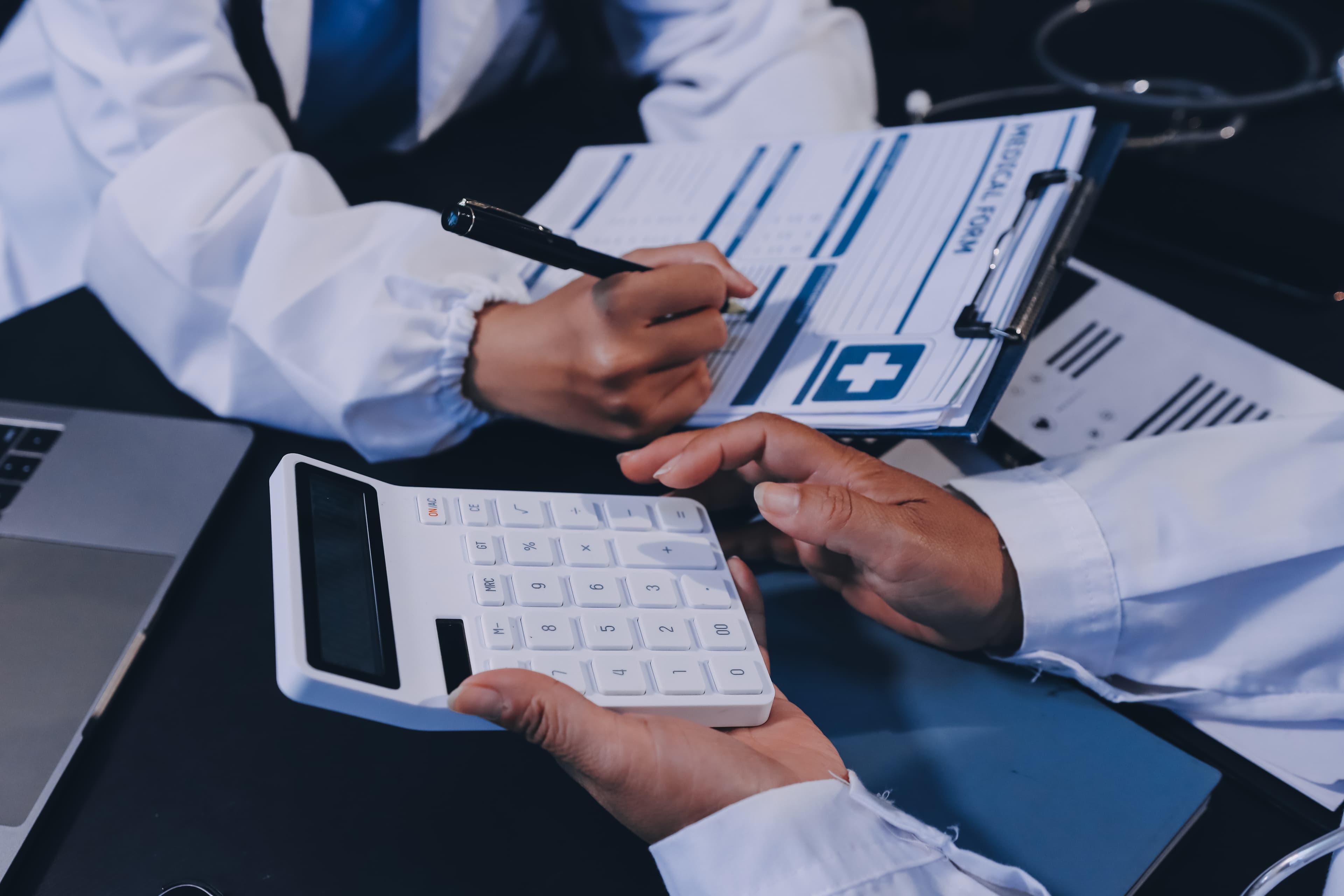 Healthcare professionals reviewing care documentation
