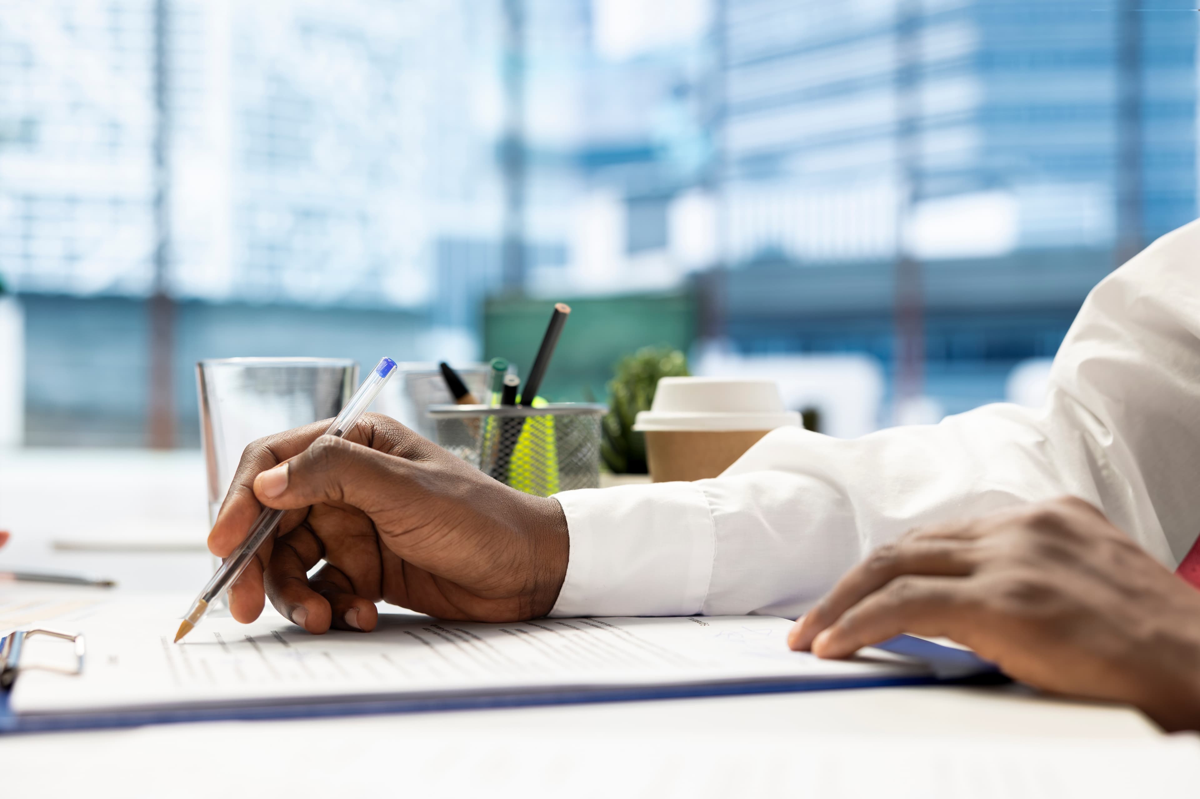 Healthcare professional reviewing compliance documentation